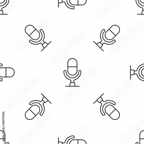 Grey line Microphone voice device icon isolated seamless pattern on white background. Microphone interpreter and alphabet letters. Vector