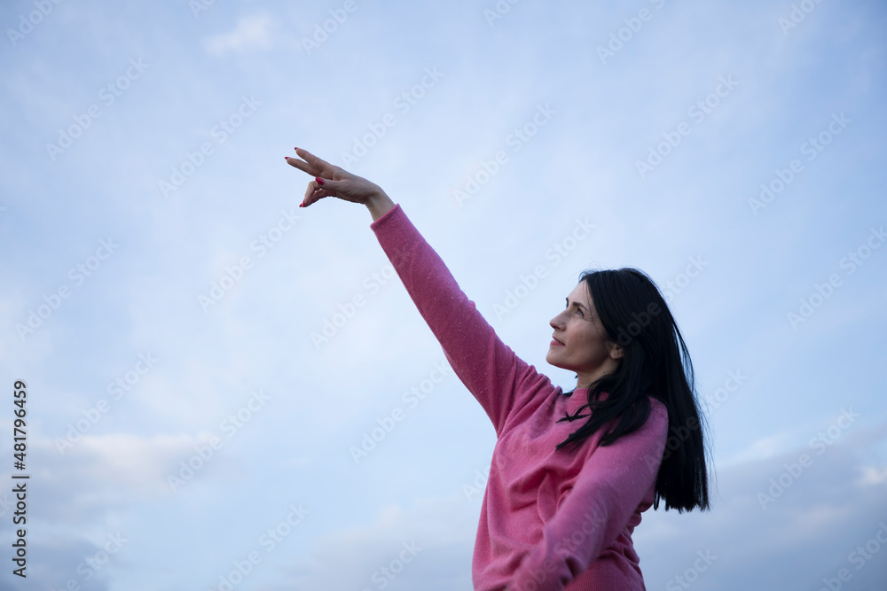 Happiness and freedom. Young at sunset woman. Lifestyle. Photo. Happiness and freedom. Young at sunset woman. Lifestyle. Photo.