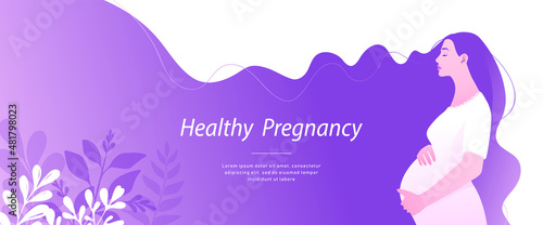 Beautiful pregnant woman expecting a baby with purple hair.