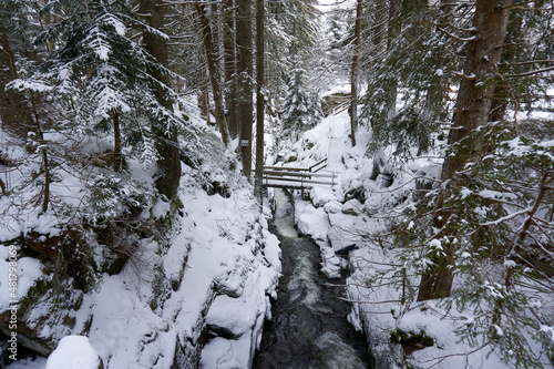 famous menzenschwander waterfalls in winter in the black forest