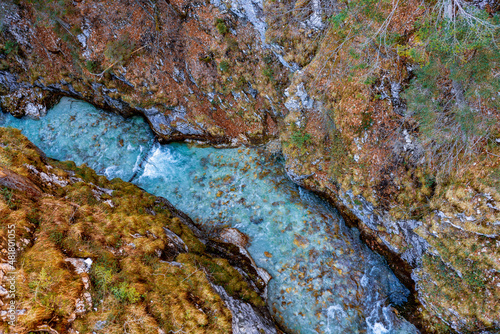 Blue water between rocks