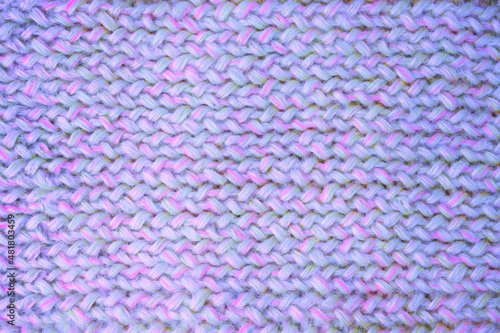 Violet-pink jersey lies on the table. View from above Violet-pink jersey lies on the table. View from above
