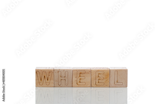 Wooden cubes with letters wheel on a white background