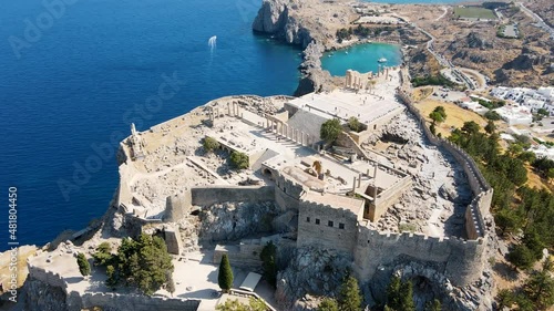 Lindos small whitewashed village and the Acropolis, scenery of Rhodos Island at Aegean Sea