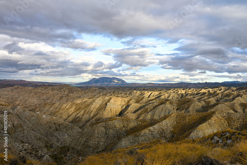 Ridges and cliffs of the Badland de los Coloraos in the Geopark of Granada photo