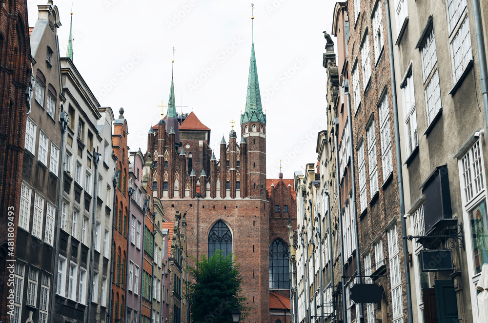 Fototapeta premium POLAND, GDANSK: Scenic cityscape view of city old center with traditional architecture and cathedral