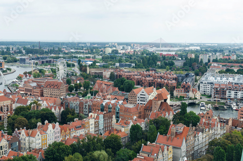 POLAND, GDANSK: Scenic landscape view of city old center with traditional architecture with red roofs © Marry