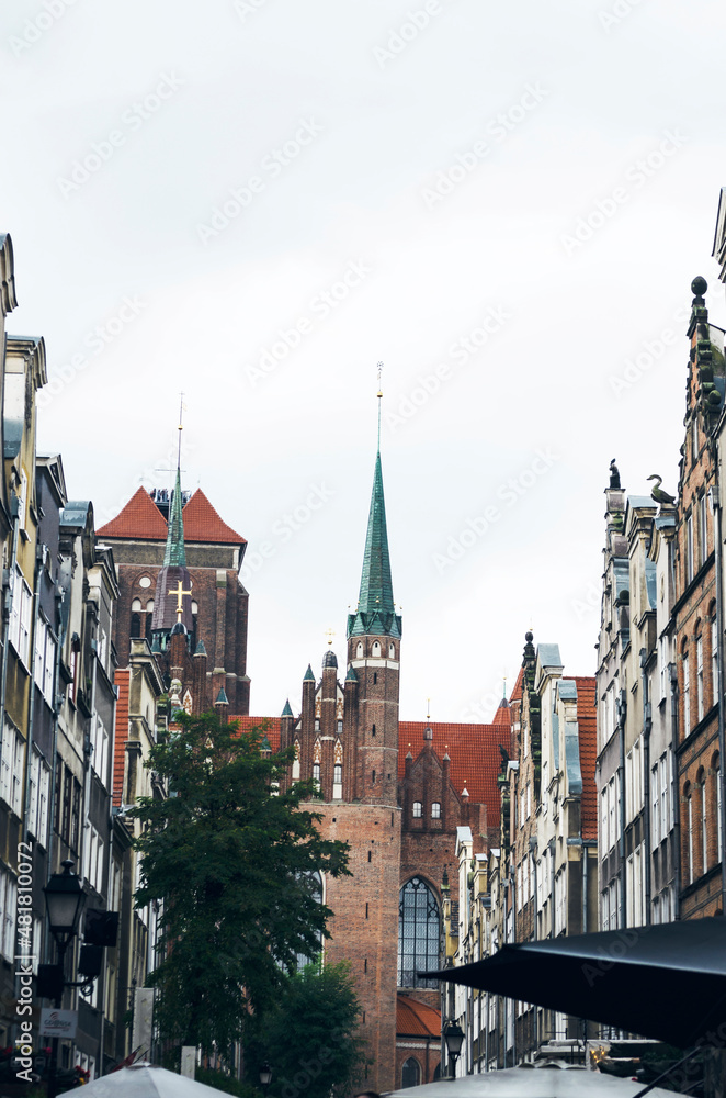 POLAND, GDANSK: Scenic cityscape view of city old center with traditional colorful architecture and red cathedral
