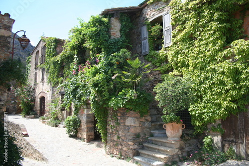 Rustic charm of medieval streets in beautiful village of Castelnou in the Pyrenees Orientales region of France.