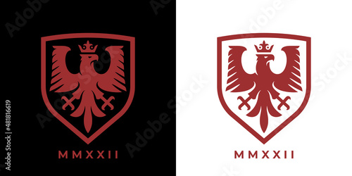 Heraldic eagle crest shield logo. Royal falcon with crown heraldry icon. Insignia hawk symbol. Royal coat of arms bird emblem. Vector illustration.