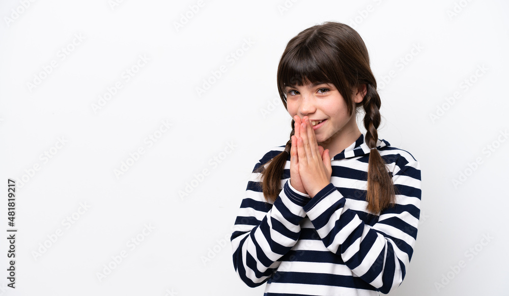 Little caucasian girl isolated on white background keeps palm together. Person asks for something Little caucasian girl isolated on white background keeps palm together. Person asks for something