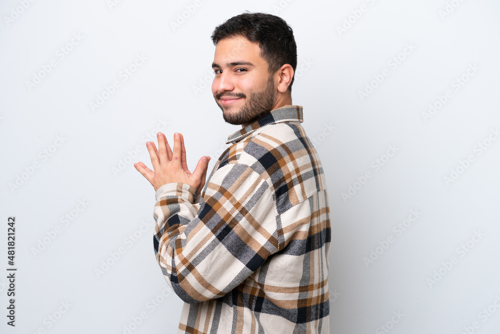 Young Brazilian man isolated on white background scheming something Young Brazilian man isolated on white background scheming something