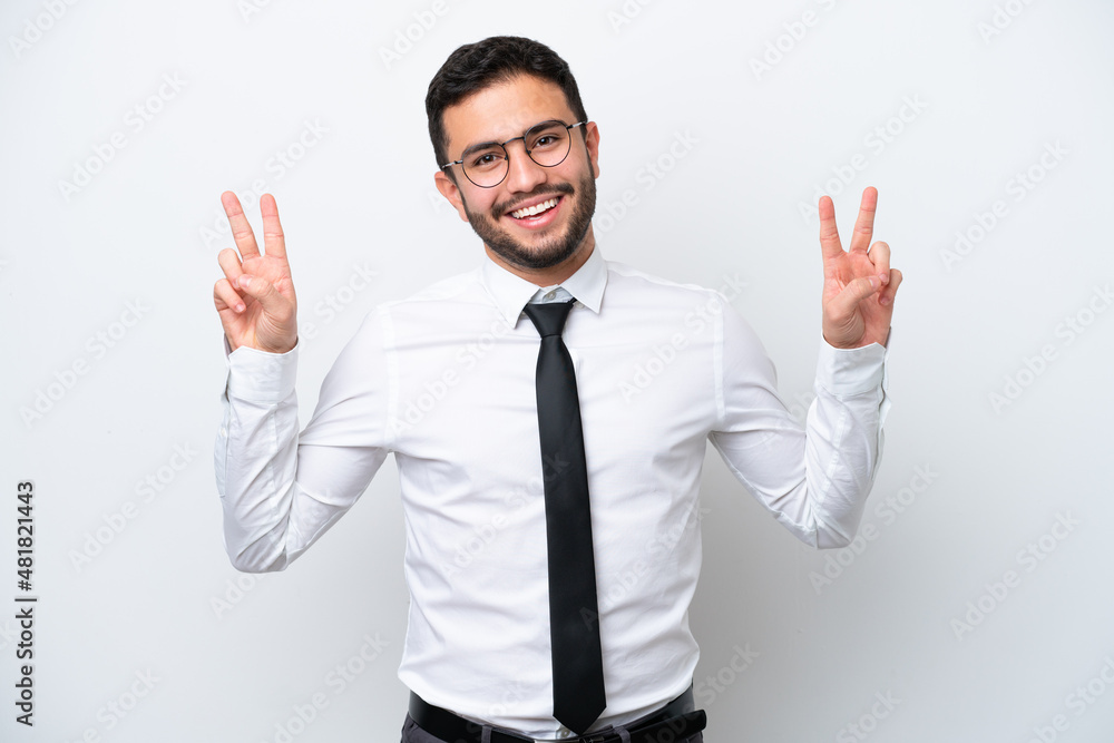 Business Brazilian man isolated on white background showing victory sign with both hands Business Brazilian man isolated on white background showing victory sign with both hands