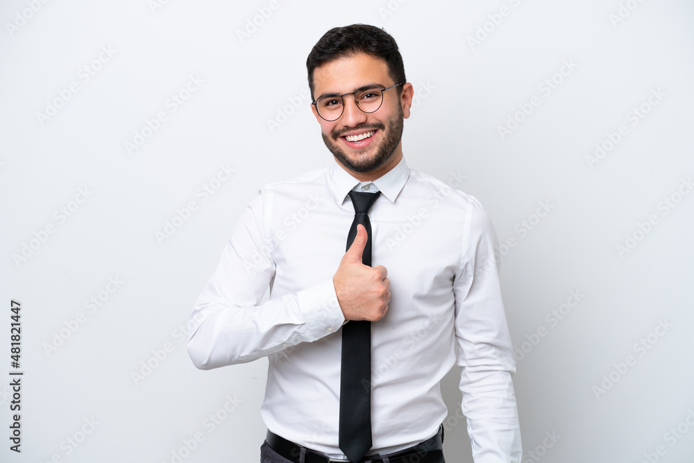 Business Brazilian man isolated on white background giving a thumbs up gesture