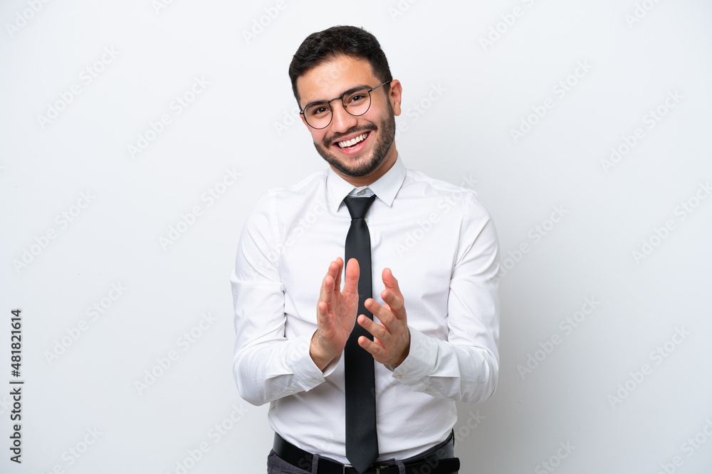 Business Brazilian man isolated on white background applauding after presentation in a conference Business Brazilian man isolated on white background applauding after presentation in a conference