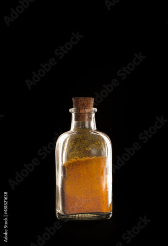 Tiny bottle of curry spice