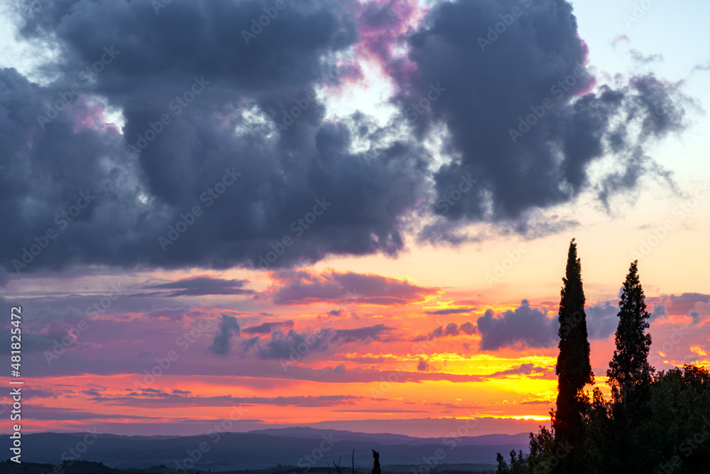 Sunset over Val d'Orcia in Tuscany Italy