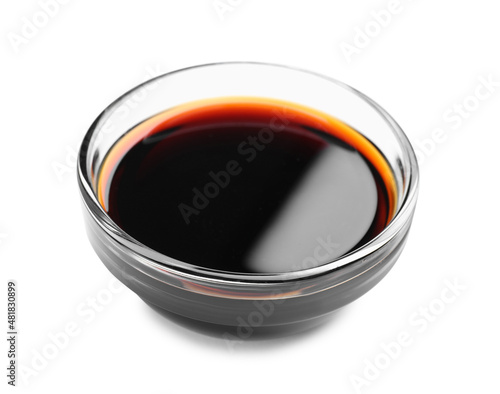Bowl of tasty soy sauce isolated on white