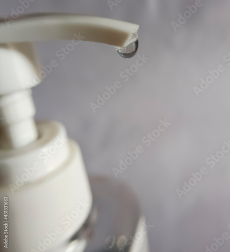 alcohol drops from a bottle