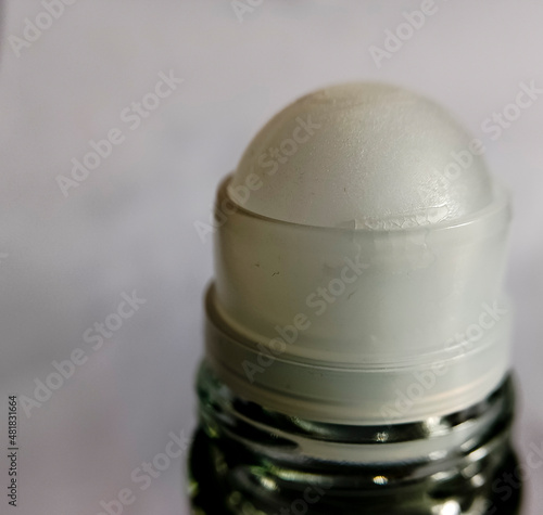 White roll-on bottle head of a product.