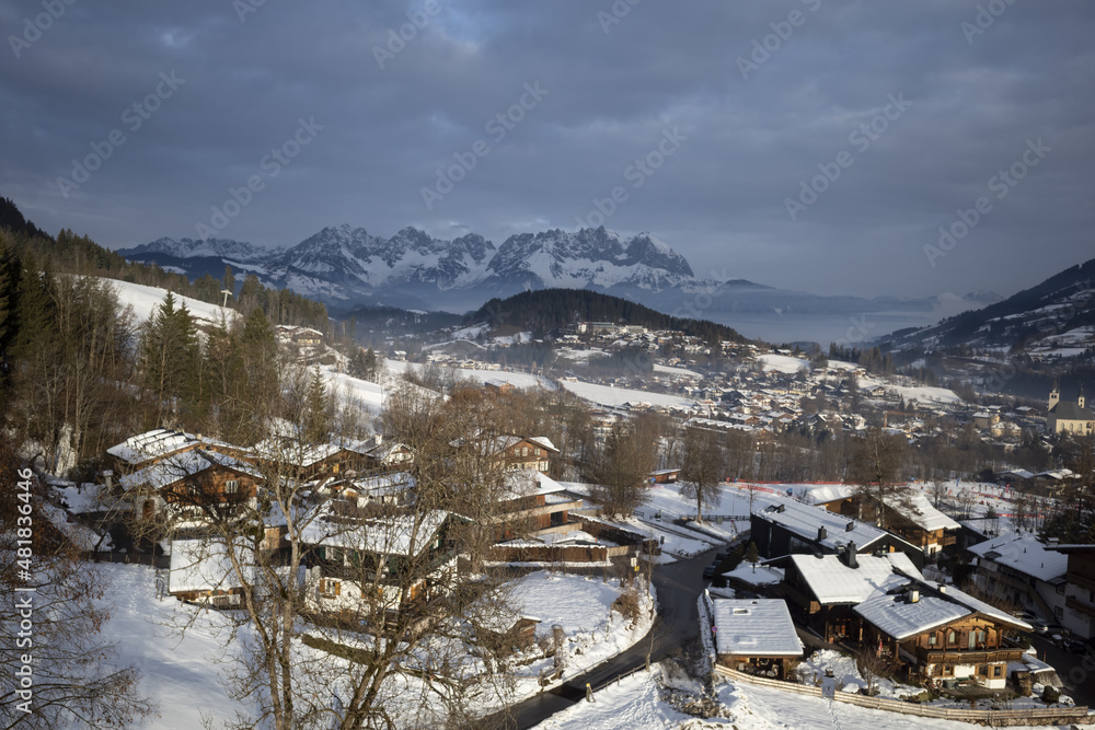 Kirchberg, Austria - December 26, 2021: Ski resort Kitzski in the Alps. Mountain snowy peaks, alpine village