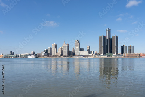 Detroit, Michigan, USA - December 26, 2021: A view of the skyline of Detroit, Michigan from Riverfront Trail in Windsor, Ontario, Canada. 