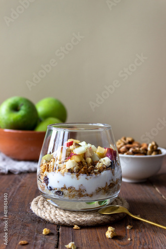 Crispy granola with apples and nuts. breakfast with granola