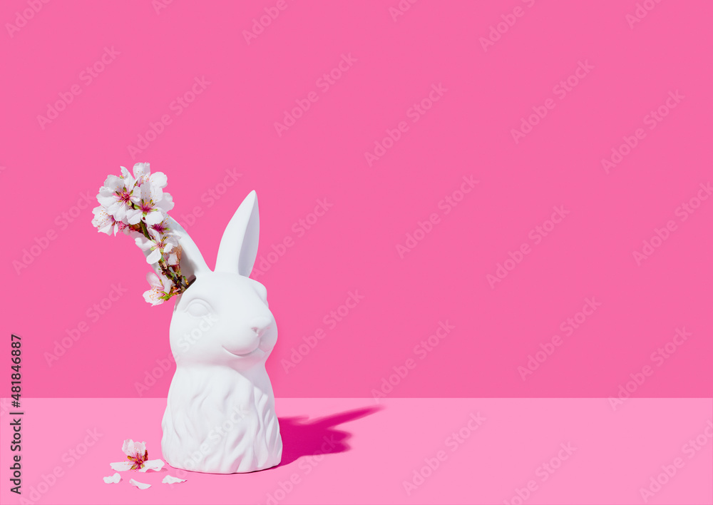 Bust of a white rabbit with almond blossoms on a pink background Stock ...