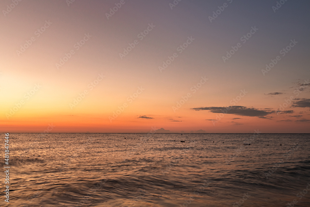 beautiful warm sunrise on a calm sea