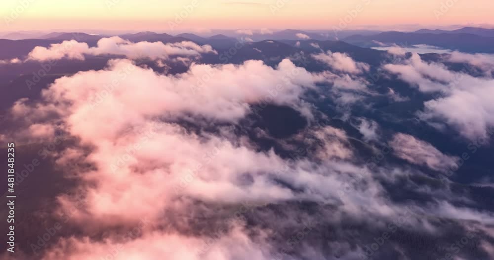 Ukraine, Carpathians, rocky peaks Gorgan - Khomyak and Synyak among wild coniferous and deciduous forests, captured aerially by a drone. After the rain in the valleys, fog and haze. copter aerial vid Ukraine, Carpathians, rocky peaks Gorgan - Khomyak and Synyak among wild coniferous and deciduous forests, captured aerially by a drone. After the rain in the valleys, fog and haze. copter aerial vid