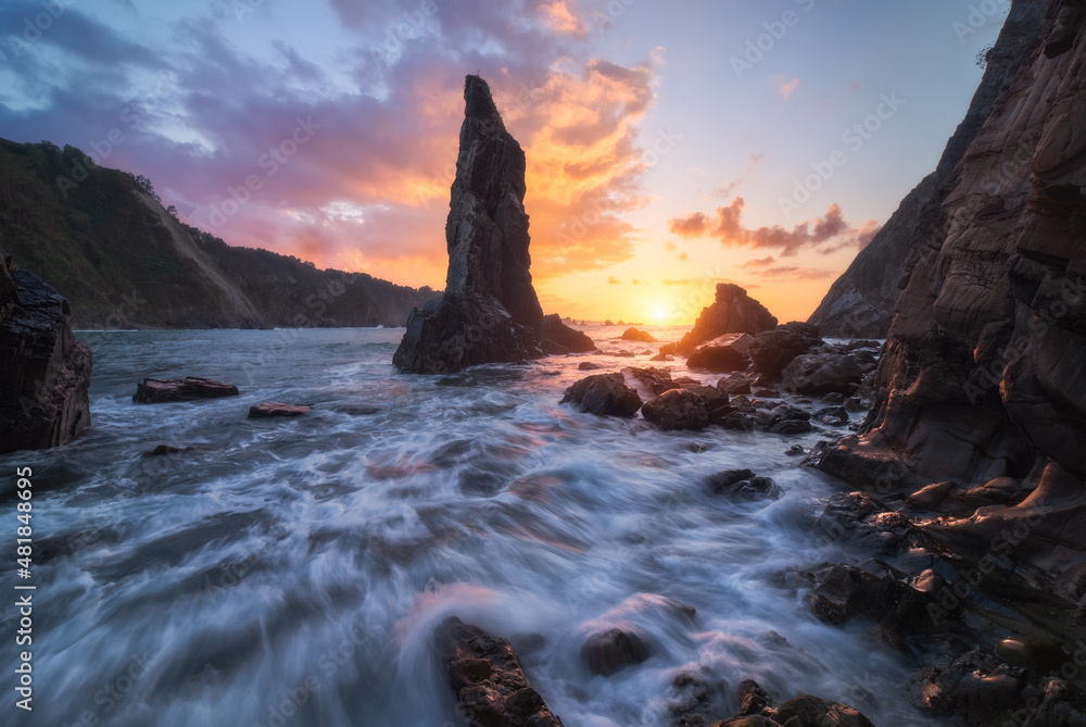 Rocky formations in flowing sea Rocky formations in flowing sea