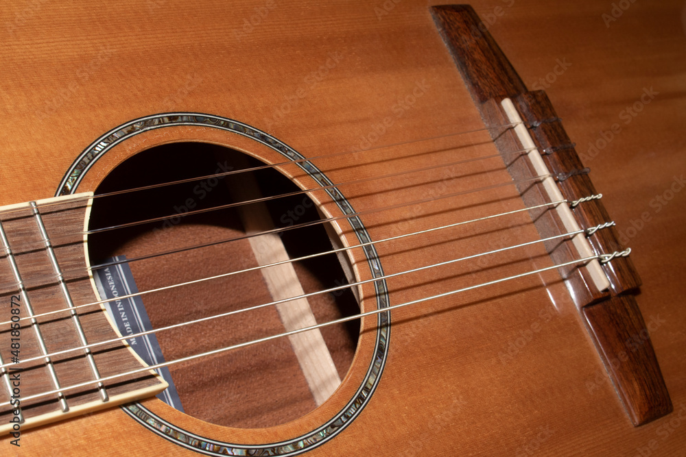 Obraz premium Close Up of an Old Vintage Acoustic Guitar Strings and Neck