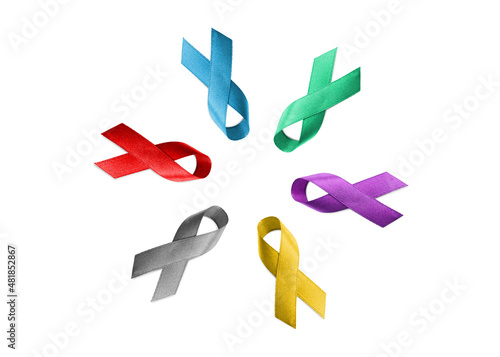 Set with different color ribbons on white background, top view. World Cancer Day photo