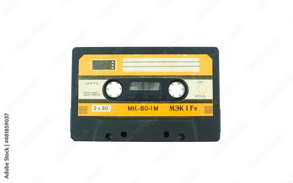 Obraz premium Audio compact cassette. Audio cassette on a white background, front view. analog format for audio playing and recording