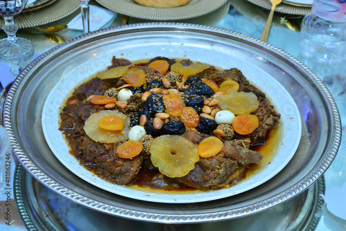 Meat dish with plum, dried pineapple and almonds. One of the most famous Moroccan dishes