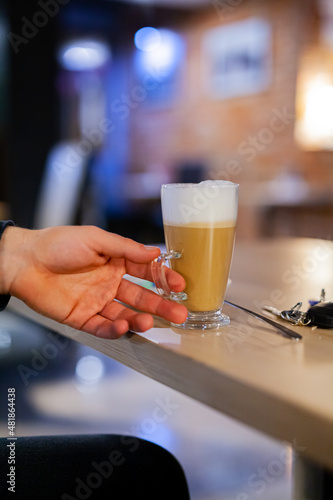 macchiato coffee in glass at cafe