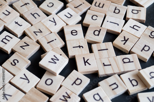 Alphabet letters on wooden scrabble pieces