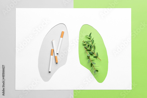 Cut paper with shape of hum...