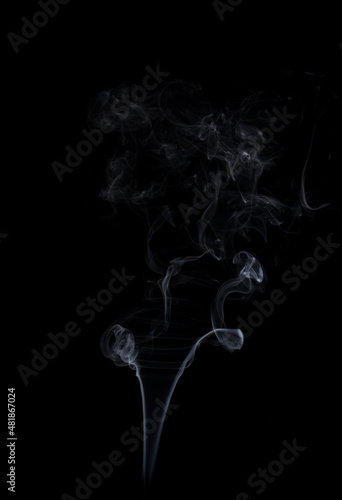 Wirling movement of white smoke, abstract line Isolated on black background.