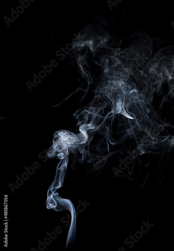 Background of abstract smoke on dark background.