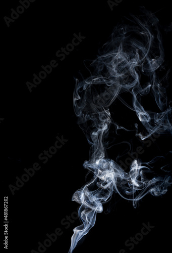 White smoke on a black background. ISOLATED