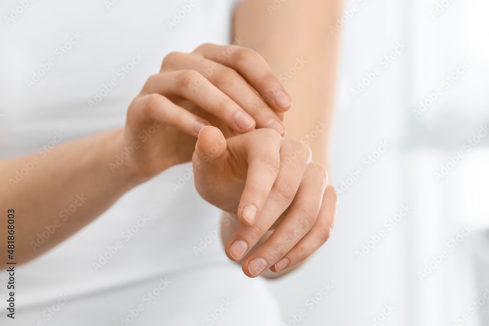 Hands of beautiful young woman at home, closeup Hands of beautiful young woman at home, closeup