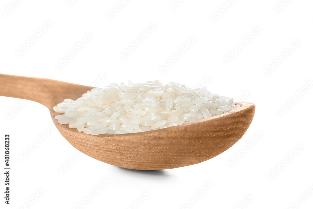 Spoon with raw rice isolated on white Spoon with raw rice isolated on white