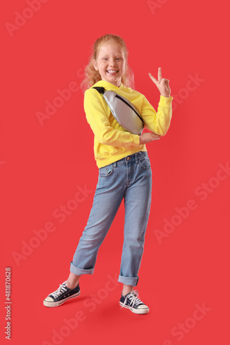 Little girl with bum bag on...