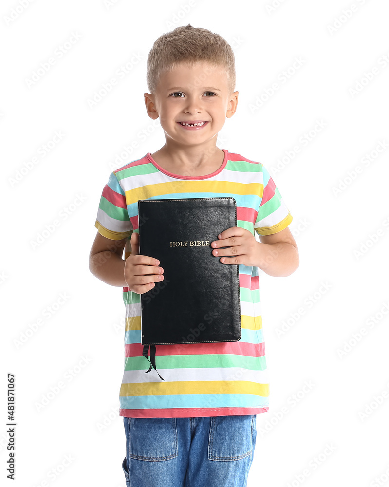 Adorable little boy with Holy Bible on white background Adorable little boy with Holy Bible on white background