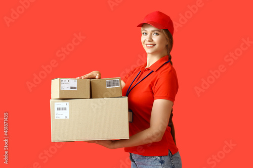 Female courier with parcels...