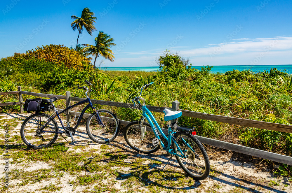 Two bikes parked at a beach in Bahia Honda State Park - Florida.