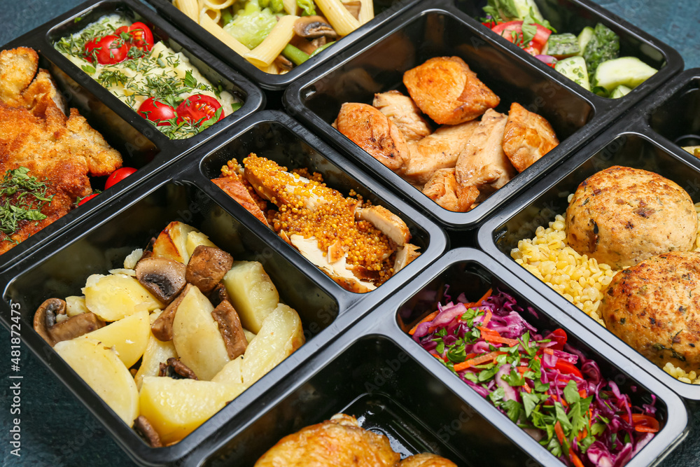 Food delivery containers with different delicious meals, closeup Food delivery containers with different delicious meals, closeup