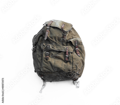 old canvas backpack isolated on white background