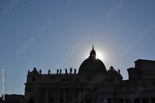 castle silhouette in italy at sunset, with blue sky and details of the statues